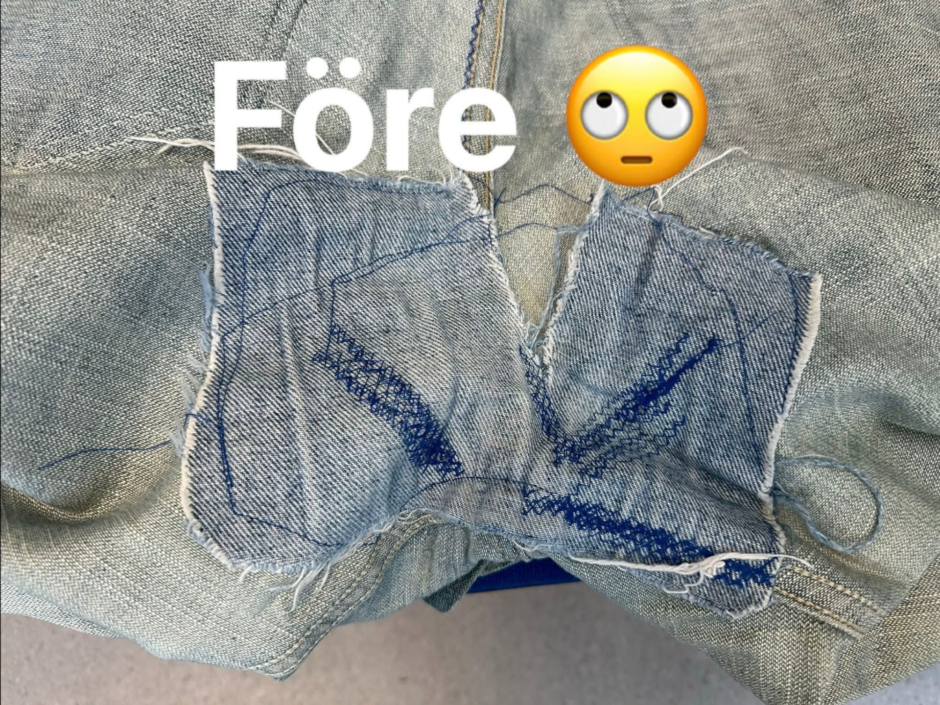 Lösa lagningar på insidan av ett par Wrangler-jeans