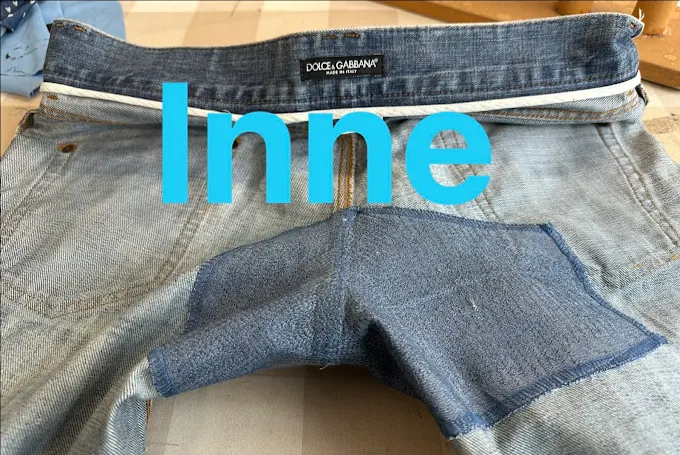 Insidan av jeansen med förstärkt lagning